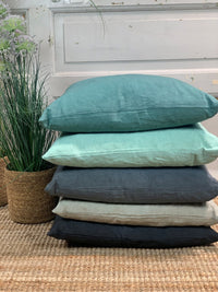 Linen cushion collection, where the colors are tone on tone