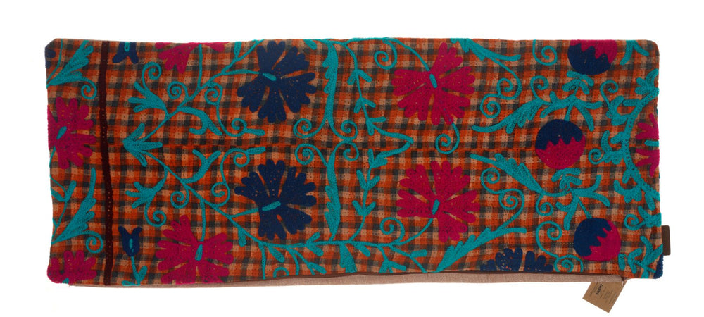 Suzani cushion cover 50x50 cm with orange checkered base and colorful flowers and creepers in turquoise and magenta with oriental dark blue details