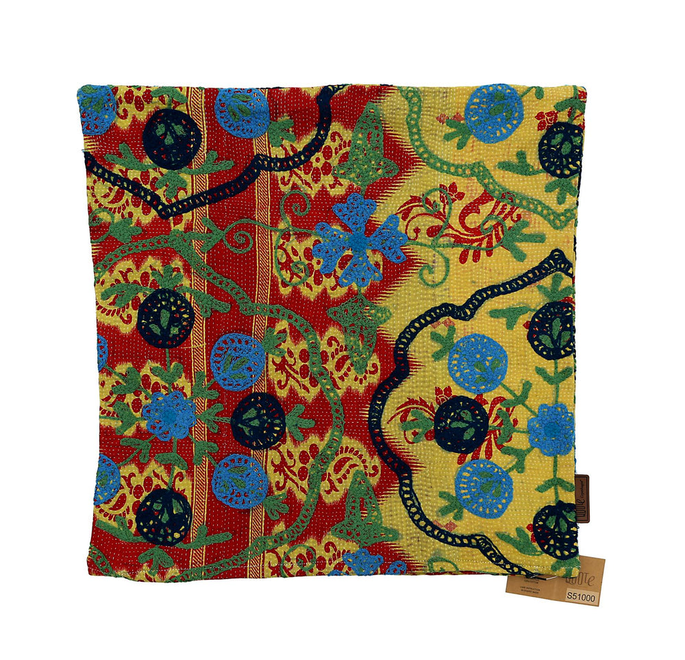 Colorful suzani pillowcase with oriental flowers and ornate tendrils in red, yellow, blue and green with black outlines for boho pillow