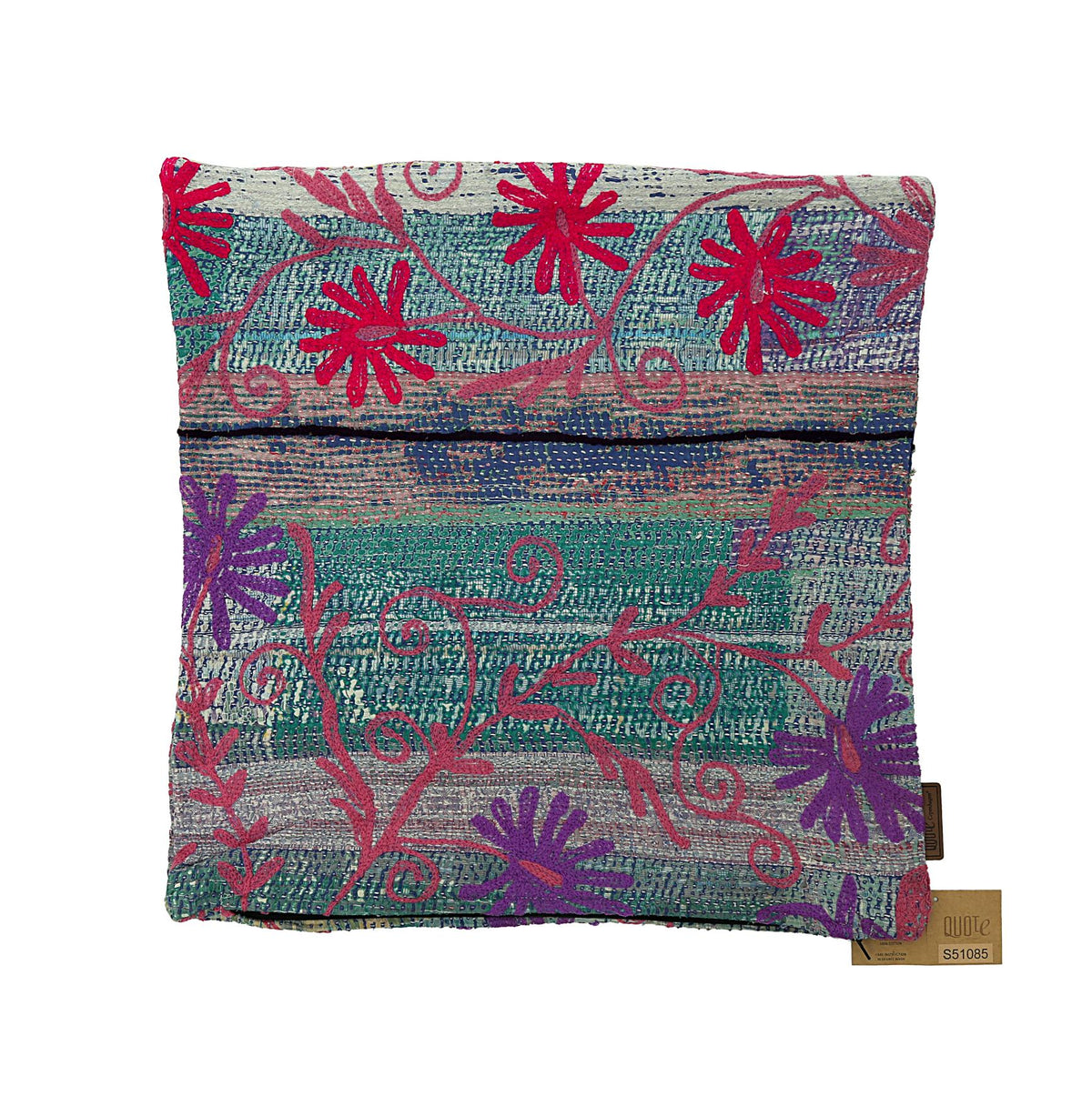 Colorful sari pillowcase with suzani-inspired flowers in magenta and purple on a teal green and gray striped base