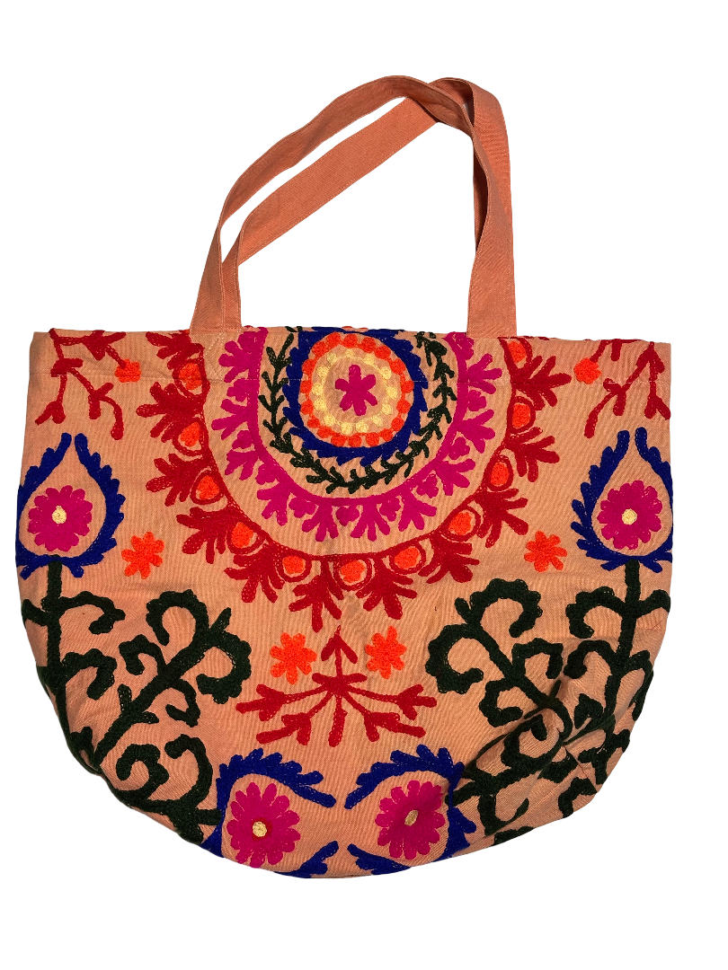 Suzani canvas beach bag with embroidery in peach, orange, navy blue and black, front view