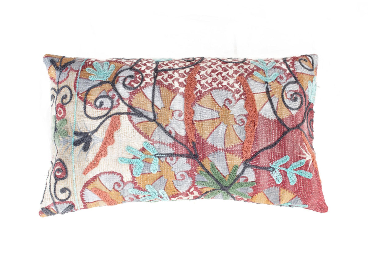 Unique suzani pillowcase 30x50 cm in vintage boho style with colorful embroidered pattern in burgundy beige and turquoise on Indian canvas.