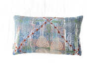 Unique suzani pillowcase 30x50 cm in blue and green squares with beige patterns and orange thread lines on ethnic boho vintage texture