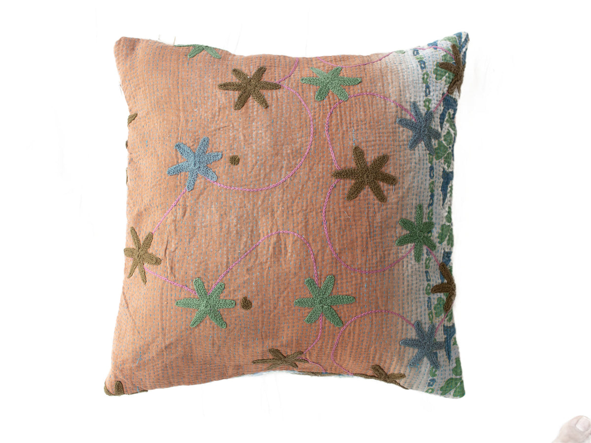 Suzani cushion cover 50x50 cm in warm terracotta with embroidered star flowers in turquoise green and blue and purple swirls in ethnic boho style